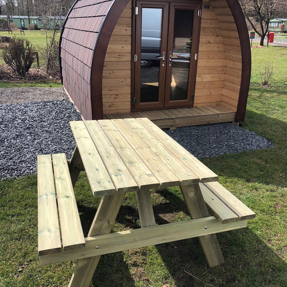 A-frame 6 seater timber picnic bench in campsite