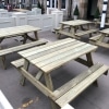 Wooden pub style 6 seater picnic benches in a bar