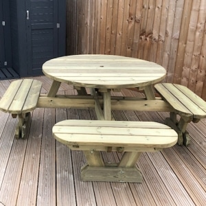 8-seater traditional pub style picnic bench with rounded edges in outdoor venue