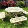 Traditional wooden round picnic bench with rounded seats