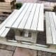 8 seater H-frame wooden picnic table in outdoor courtyard venue